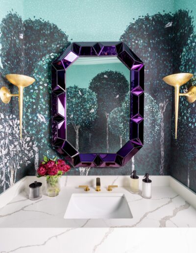 A bathroom with a mirror and sink in it