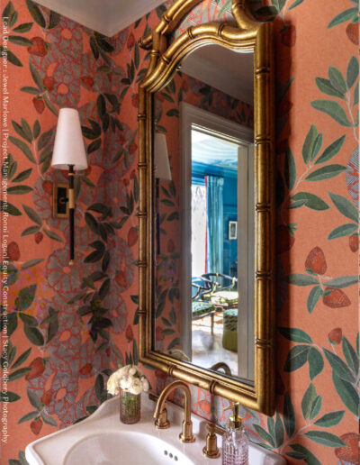 A mirror and wall in the bathroom