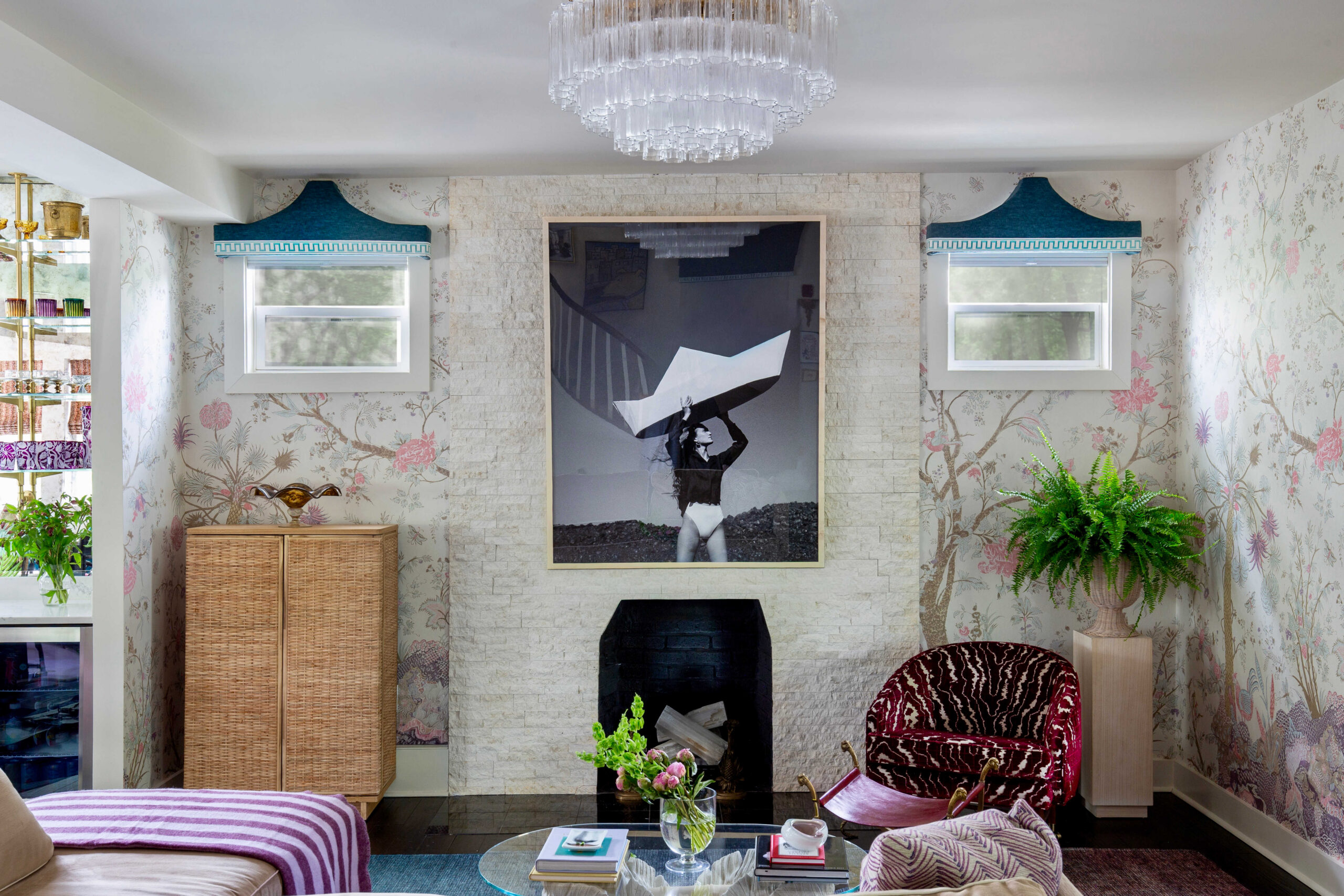 Jewel Marlowe interior design living room with pagoda valances, crystal chandelier, brass bar, custom sofa, highland house, art star, custom chair